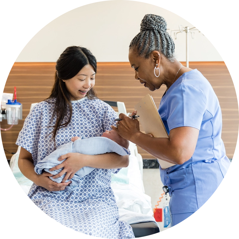 new mother with life line nurse filling out form