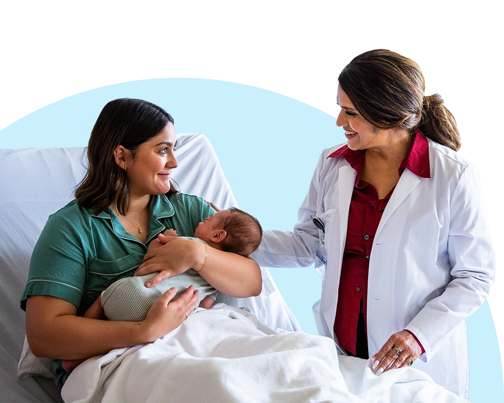 new mom with her infant and doctor