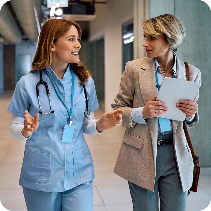 Hospital nurse talking with a Life Line representative 